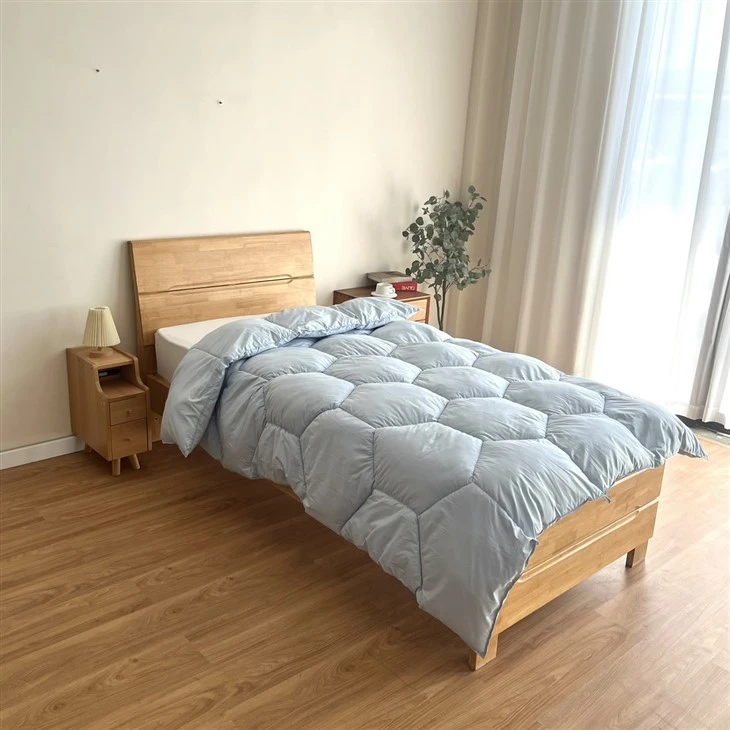 Ademend gewatteerd dekbed